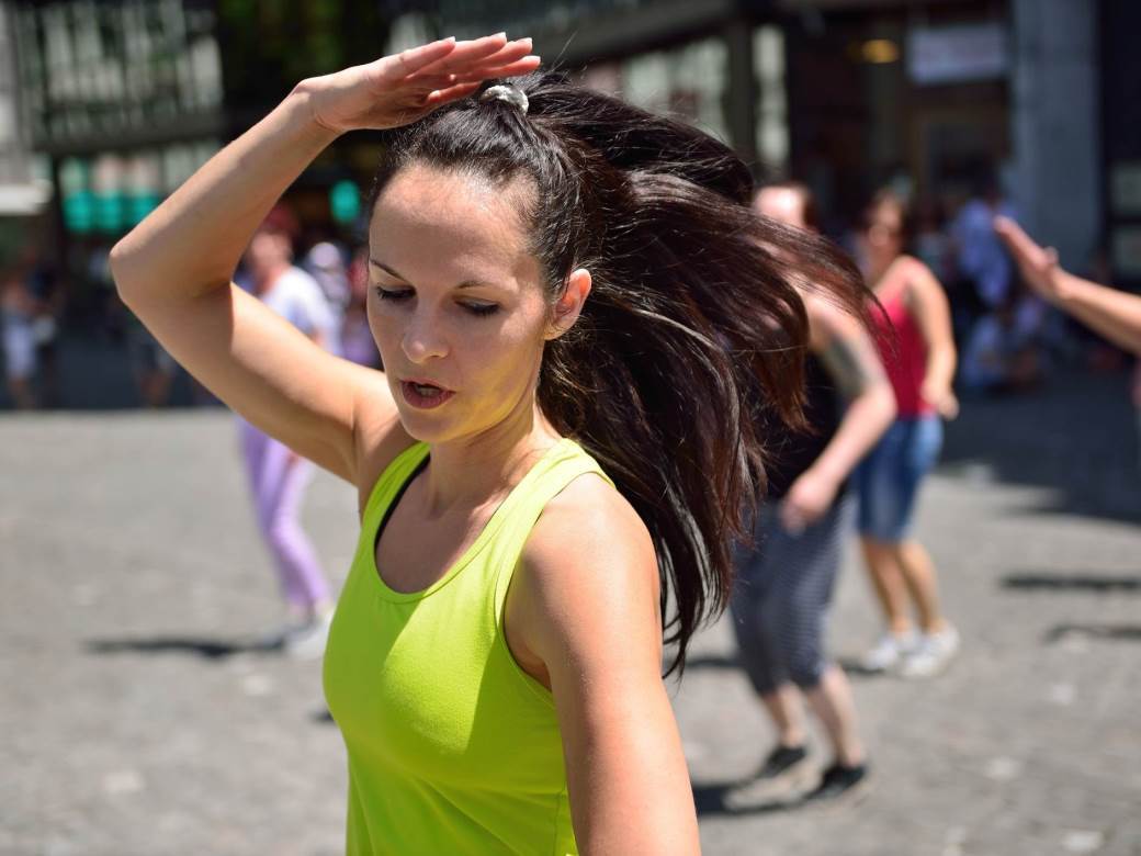 Flashmob on the street on a sunny day