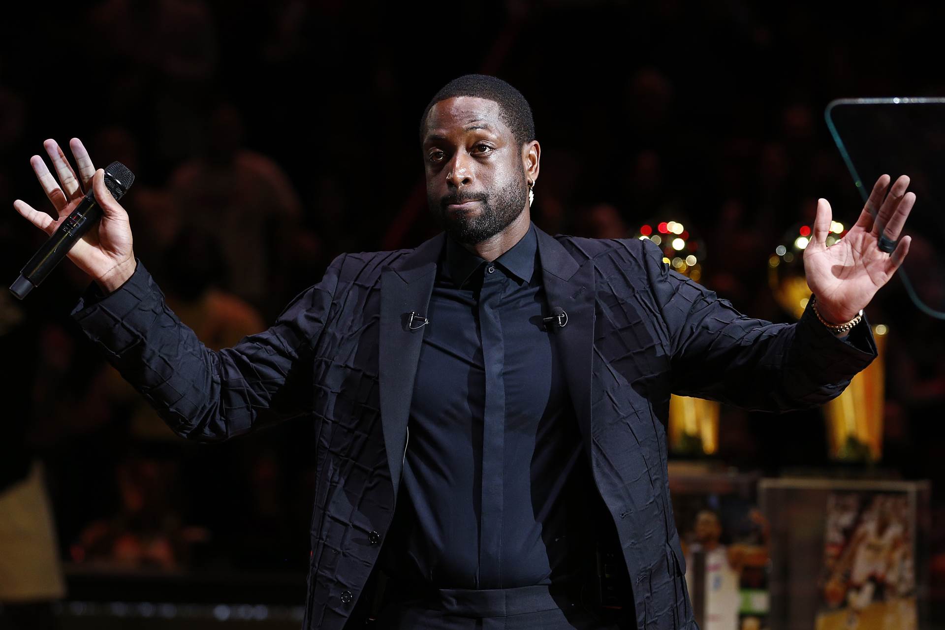 MIAMI, FLORIDA - FEBRUARY 22: Former Miami Heat player Dwyane Wade reacts during his jersey retirement ceremony at American Airlines Arena on February 22, 2020 in Miami, Florida. NOTE TO USER: User expressly acknowledges and agrees that, by downloading and/or using this photograph, user is consenting to the terms and conditions of the Getty Images License Agreement. (Photo by Michael Reaves/Getty Images) 
