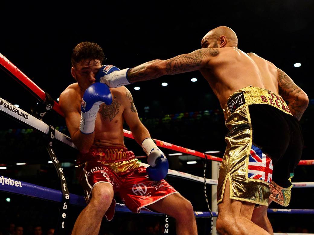  MONDO-IKONE-12-Lion-MekKenzi-fudbaler-i-bokser-Kristal-Palas-Noric-golovi-Premijer-liga 