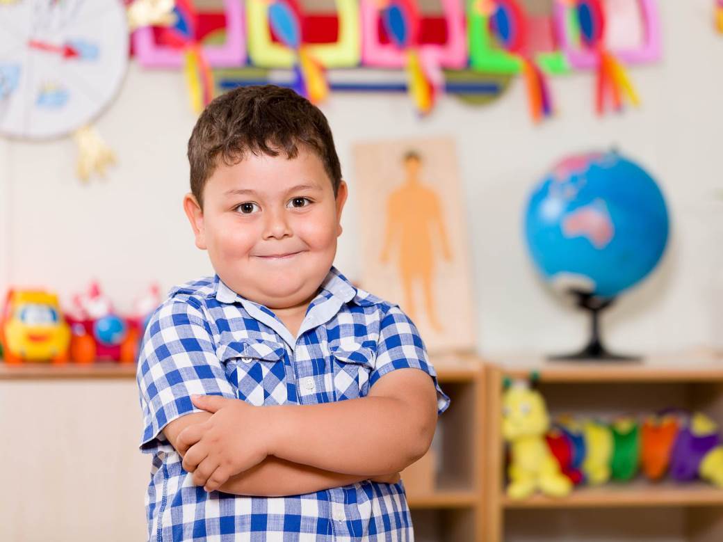 Preschool child in classroom.