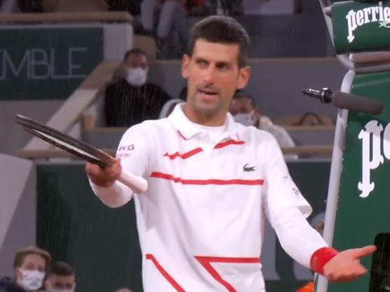  Novak-Djokovic-Rolan-Garos-prekid-kisa-reakcija-foto-video 