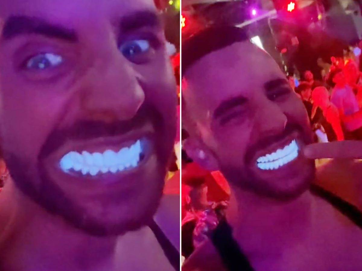  Muškarac sa svijetlećim zubima 
