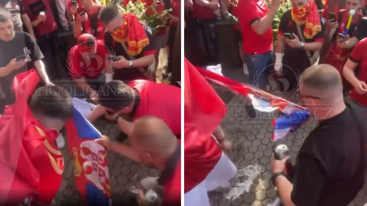  Navijači Albanije cijepaju zastavu Srbije  