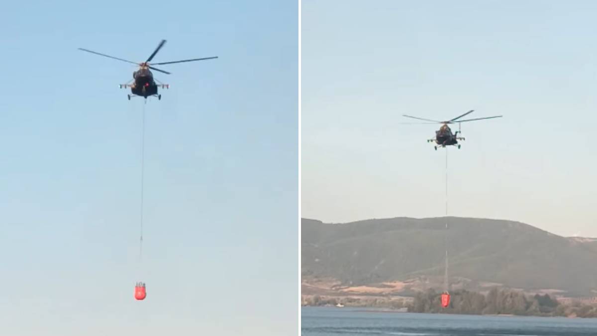  Helikopter uzima vodu iz Dunava i gasi požar kod Golupca 