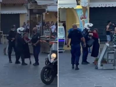 Uznemirujući prizor na trgu popularnog grčkog ostrva: Policajci vukli ženu po ulici (VIDEO) 