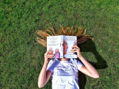  reading-a-book-on-the-grass_t20_rodjAX 