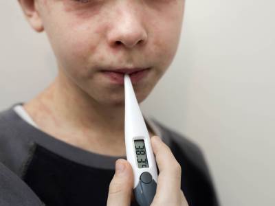  portrait-of-sick-sad-boy-child-with-thermometer-ha-2022-09-21-18-28-31-utc.jpg 
