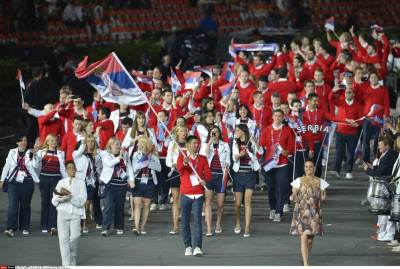  Zastavu Srbije na Olimpijskim igrama  odbojkašica Maja Ognjenović i vaterpolista Dušan Mandić   