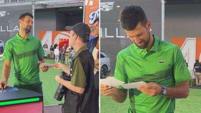  novak djokovic trazio autogram od fotografa 