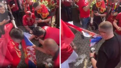  Navijači Albanije cijepaju zastavu Srbije  