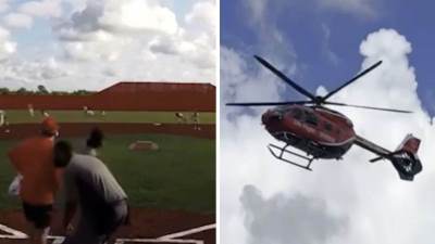  Trener ranjen na bejzbol utakmici 