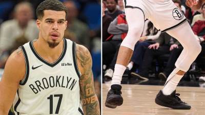  Majkl Porter Džunior nosi steznik 