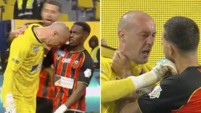  Milan Borjan u klinču sa saigračima 